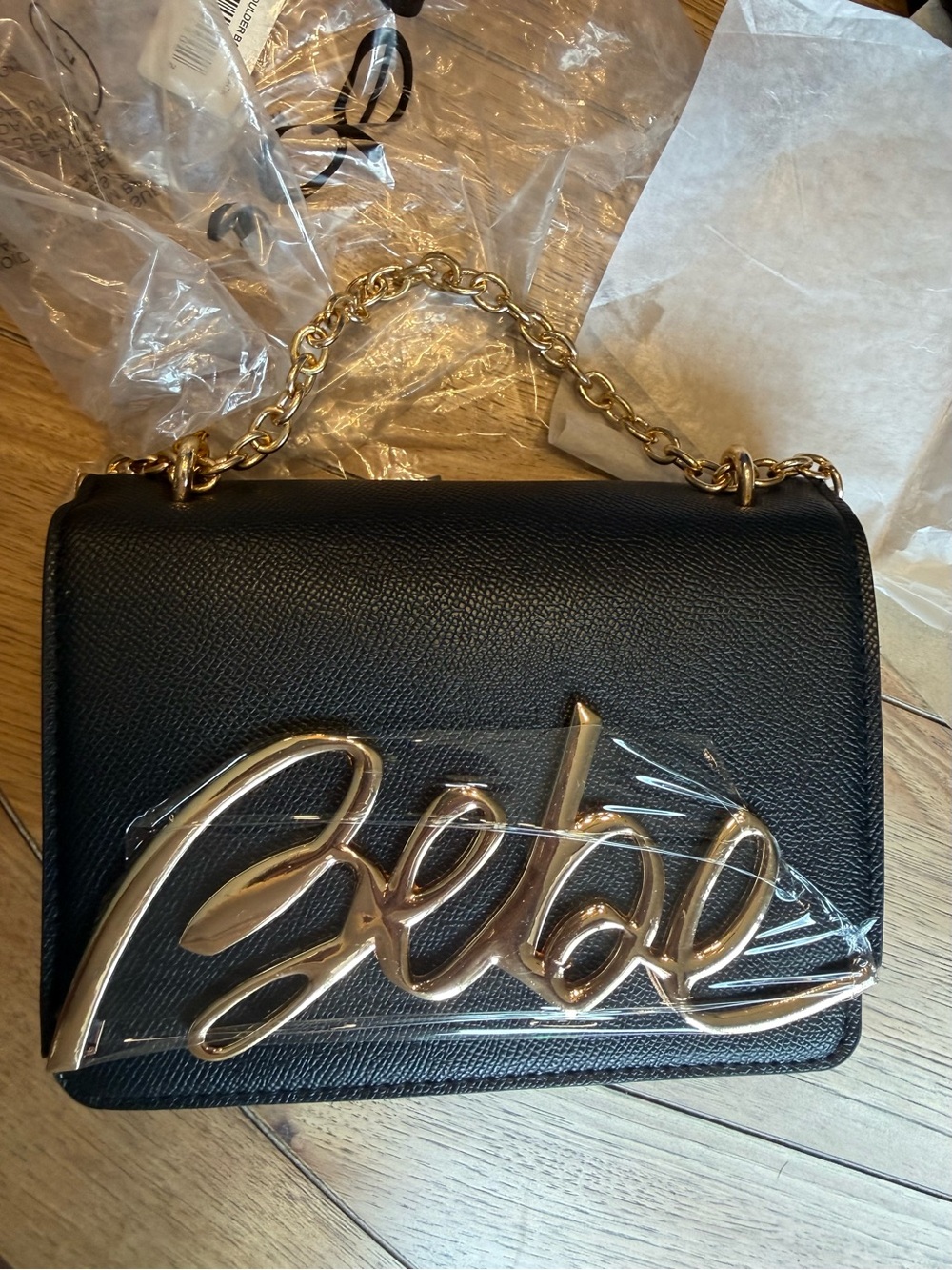 bebe Black Crossbody Bag with Gold Script Logo